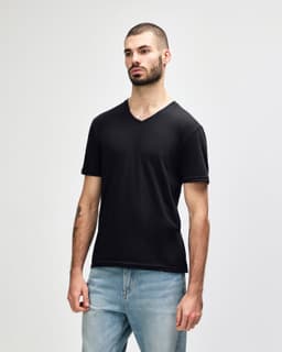 A black Gildan Softstyle adult V-neck T-shirt displayed on a male model, featuring a logo.