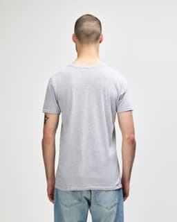 A grey Gildan Softstyle adult v-neck t-shirt displayed from the back, featuring a plain design and a logo.