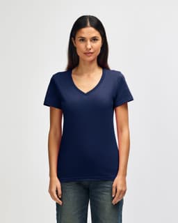 A navy Gildan Softstyle ladies' V-neck T-shirt displayed on a model, featuring a simple design and branding.