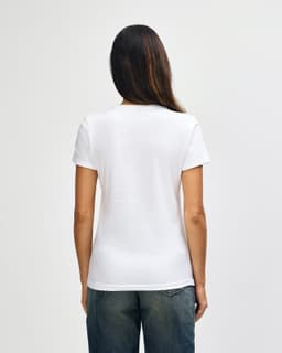 A white Gildan Softstyle ladies' V-neck T-shirt displayed from the back, showcasing a simple design and fit.