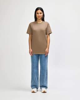 A midweight adult t-shirt in a taupe colour, featuring a crew neck and short sleeves, with a branding logo.