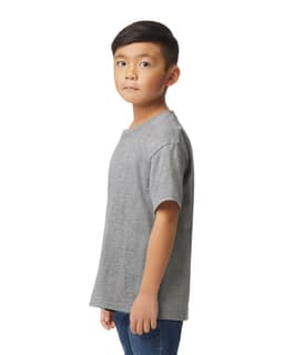 A grey Gildan Softstyle youth midweight T-shirt shown from the back on a boy, featuring short sleeves.