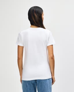 A white Gildan Softstyle ladies midweight T-shirt shown from the back, featuring a simple design and casual fit.
