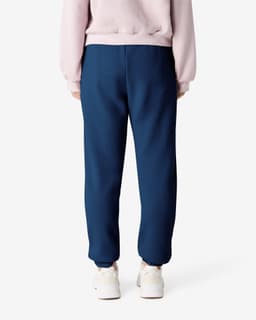 Unisex sweatpants in navy with a fitted cuff and a branding logo on the fabric.