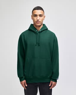 An olive green pullover hooded sweatshirt with a front pocket and a logo on the sleeve.