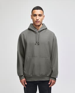 A hooded sweatshirt in olive green, featuring a kangaroo pocket and an adjustable drawstring hood.