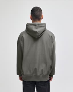 A pullover hooded sweatshirt in olive green, featuring a hood and a casual fit. It has a logo on the back.