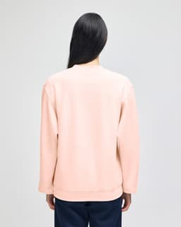 A grey Champion Powerblend® adult crewneck sweatshirt viewed from the back, featuring a relaxed fit and long sleeves.