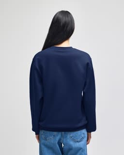 A navy blue crewneck sweatshirt with long sleeves, viewed from the back, featuring a logo.
