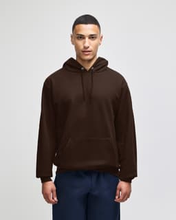 A brown pullover hooded sweatshirt with a front pocket and loose fit, featuring a logo on the chest area.