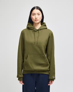 A green pullover hooded sweatshirt with a front pocket and a logo. Featuring a relaxed fit and drawstring hood.