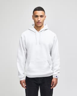 A white pullover hooded sweatshirt features a front pocket and a logo on the sleeve. Suitable for casual wear.