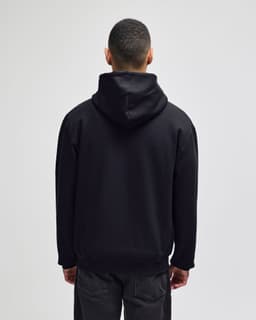 A black full-zip hooded sweatshirt displayed from the back, featuring a hood and a casual fit.