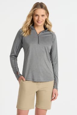 Grey long-sleeve zip-up top with a relaxed fit, paired with light beige shorts. The top features a logo on the front.