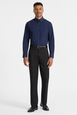 A men’s long sleeve button-up shirt in navy blue, paired with black trousers. The shirt has a logo.