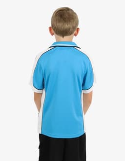 A boy wearing a blue and white polo shirt, viewed from the back, with contrasting black details.