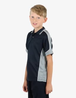 A polo shirt in navy and grey, featuring a logo, worn by a smiling young boy.