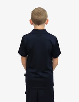 A navy polo shirt with a collar, viewed from the back on a child. The shirt has a logo on the side.