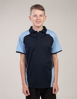 A polo shirt in navy blue with light blue accents, featuring a collar and a logo. Modelled by a young person.