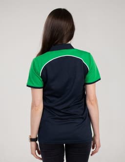 A polo shirt featuring a dark navy body with green sleeves and a logo on the collar.