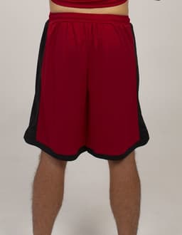 Red sports shorts with black side panels and an elastic waistband, featuring a logo.