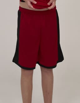 Red sports shorts with black side panels, featuring an elastic waistband and a logo.
