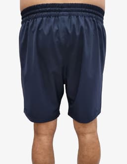 Navy sports shorts with an elastic waistband and a logo on the back. Suitable for athletic activities.