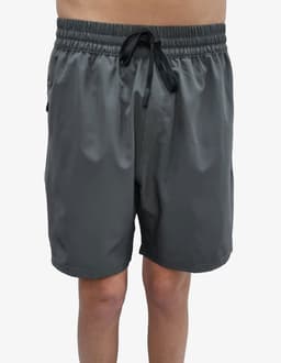 Sports shorts in dark grey with an elastic waistband and drawstring. Features a logo on the side.