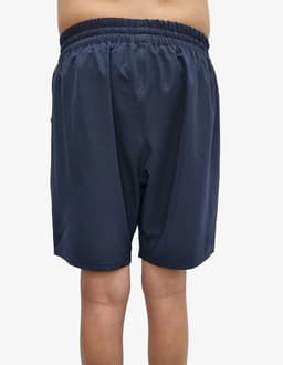 Navy sports shorts with an elastic waistband, featuring a logo on the back. Suitable for active wear.