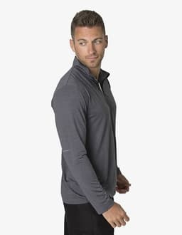 A grey long-sleeve t-shirt with a zip collar, featuring a subtle logo. The model is facing sideways.