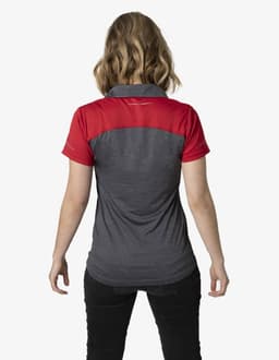 A polo shirt featuring a grey body with red sleeves and a logo on the back.