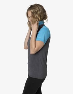 A polo shirt in grey with a blue collar, featuring a logo on the side, displayed on a model.