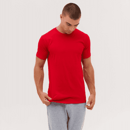 A red T-shirt is displayed on a model wearing grey shorts, with a neutral background. The shirt has no visible branding.