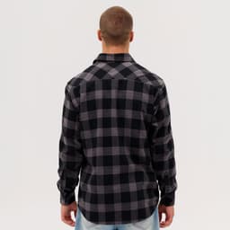 A black and grey checked flannel long sleeve shirt, viewed from the back, featuring a logo.