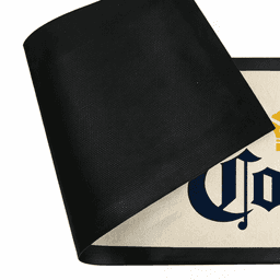 A black rubber bar mat with a textured underside and a colourful design on the top surface.
