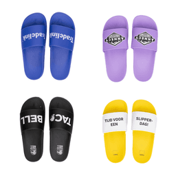 Four pairs of PVC slides in blue, purple, black, and yellow, each featuring different designs and logos.