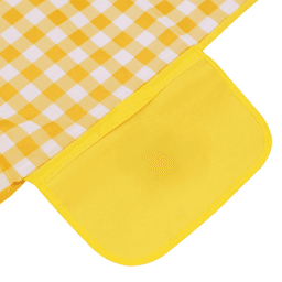 A yellow and white checked picnic blanket featuring a solid yellow pocket. It has a branded logo on the corner.