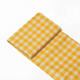 A yellow and white checked picnic blanket folded neatly, featuring a slight sheen and a compact design.