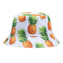 A bucket hat featuring a vibrant pineapple print on a white background, with a soft, wide brim and a logo.