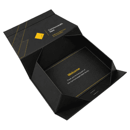 A large black magnetic gift box with ribbon, featuring an interior card. It has a logo on the exterior.