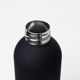 A drink bottle in matte black finish, featuring a stainless steel opening and a simple logo.