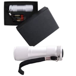 A silver flashlight in a black box, accompanied by batteries and featuring a strap for easy carrying.