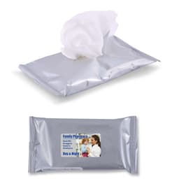A silver pouch of wet wipes with a white tissue partially exposed. The pouch features a logo.