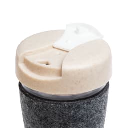 A reusable coffee cup with a gray textured band and a beige lid, featuring a logo on the side.