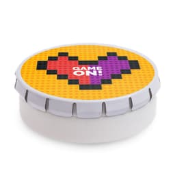 A round mint tin with a colorful pixelated heart design in red and purple on a yellow background.