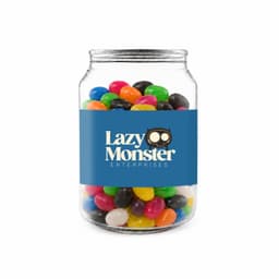 A clear jar filled with assorted jelly beans in various colours, featuring a label with a logo.