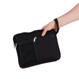 A black utility pouch with a zippered compartment and a mesh pocket, held by a hand. It has a hand strap.
