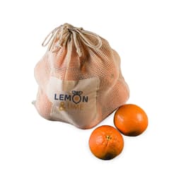 A beige mesh bag filled with oranges, with two oranges placed beside it. The bag features a logo.
