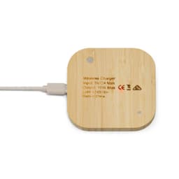 A square wireless charger made of bamboo with a cable connected, featuring a logo and minimal design.
