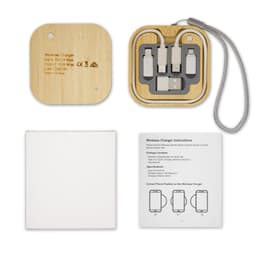 A square bamboo wireless charger set featuring multiple charging cables and a user instruction guide.